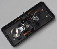 7701026301 - Base farolim trás SEIMA esquerdo