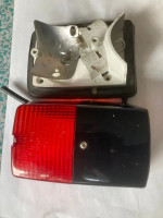 7701367537 - Farolim matricula SEIMA esquerdo c/nevoeiro